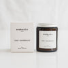 eco-friendly rose and sandalwood rapeseed and coconut wax candle in amber glass jar