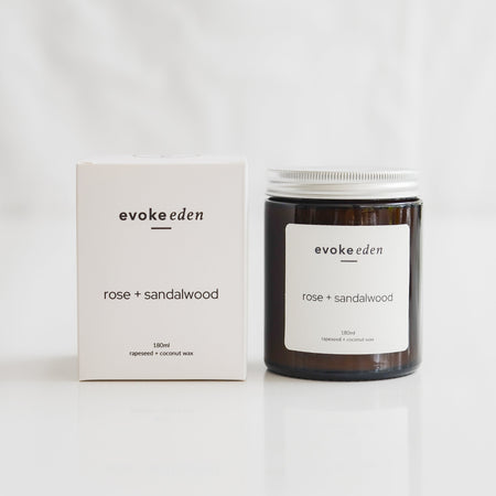 eco-friendly rose and sandalwood rapeseed and coconut wax candle in amber glass jar
