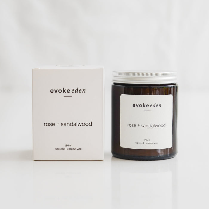 eco-friendly rose and sandalwood rapeseed and coconut wax candle in amber glass jar